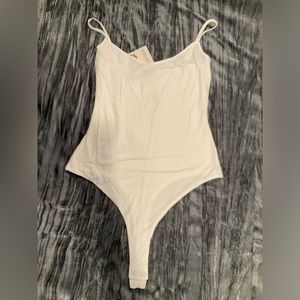 Naked wardrobe white bodysuit